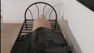 www.naughtynina.net - Gagged, Nylon Encased, Bed Frame Tied and Buzzing thumbnail